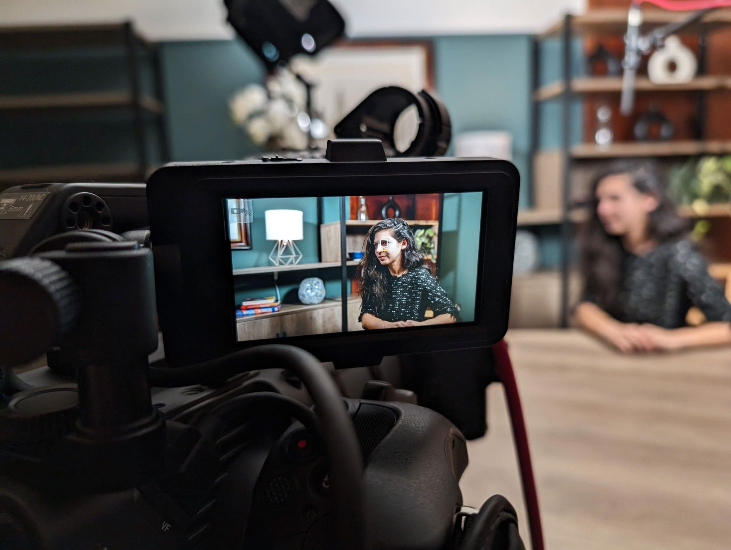 Person sitting in front of camera