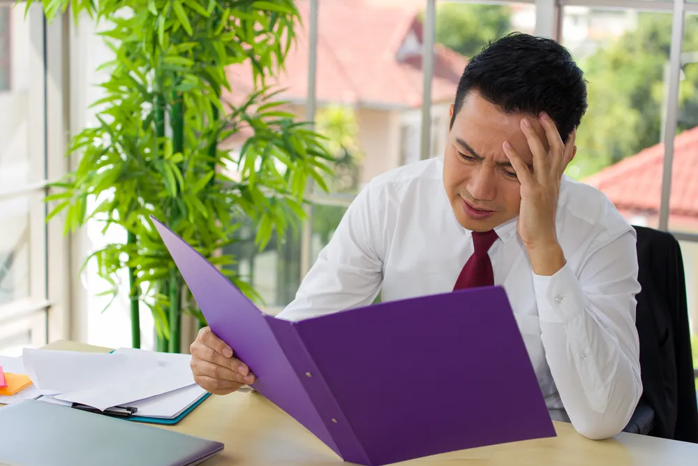 stressed asian working professional