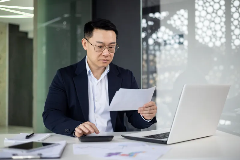 asian professional working in an office